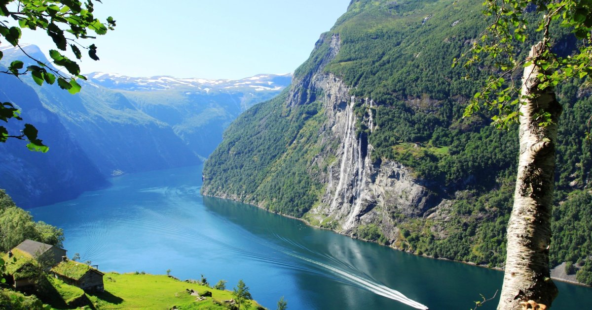 Image of a Norwegian fjord with a cruise ship.